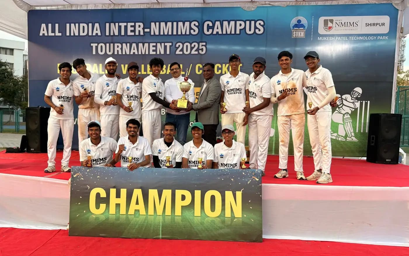 Champions with the trophy